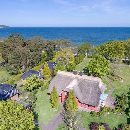 Prázdninový dům Reethaus Strandzeit In - Haushaelfte 1 Lobbe